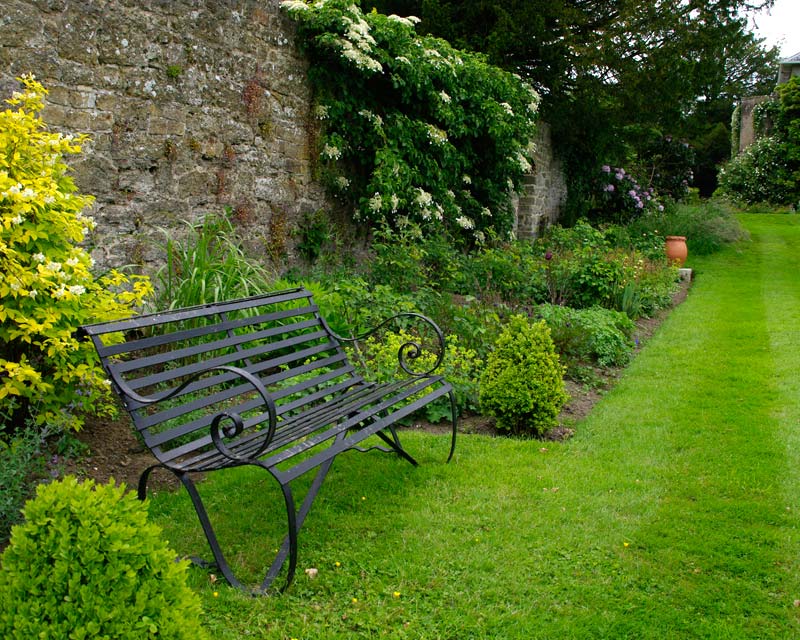 Lush borders to sit and contemplate at Fittleworth House