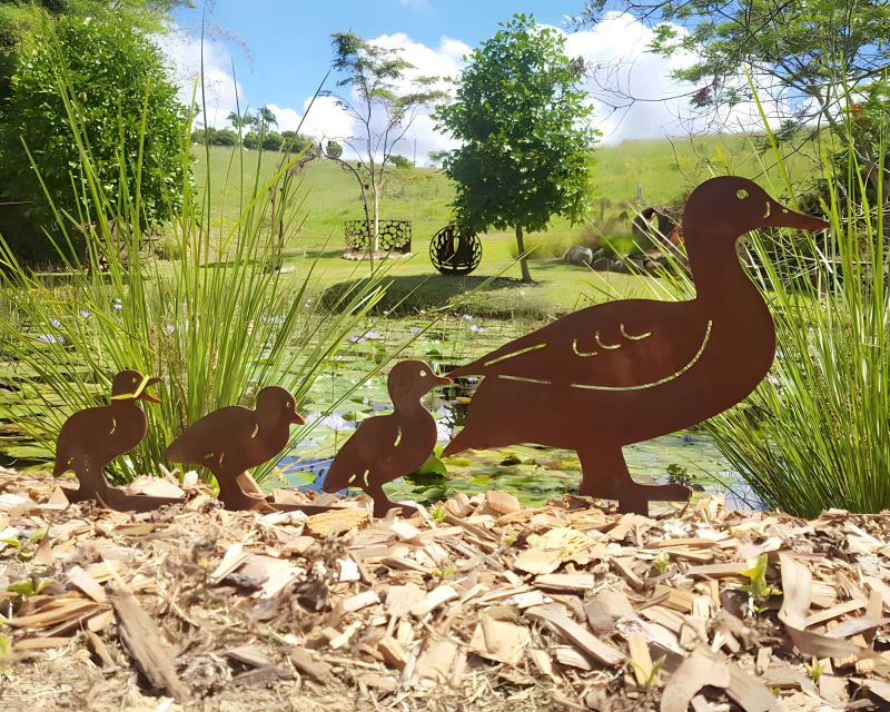 Duck and ducklings - decorative garden art