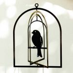 Bird in Bell Cage - suspended art 