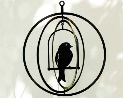 Suspended art - bird in a circular cage