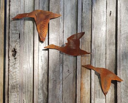 Flying ducks - decorative garden art