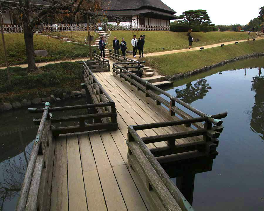 Korakuen Garden - Eisho Bridge over Kayo-no-ike Pond, is a wooden zig-zag bridge