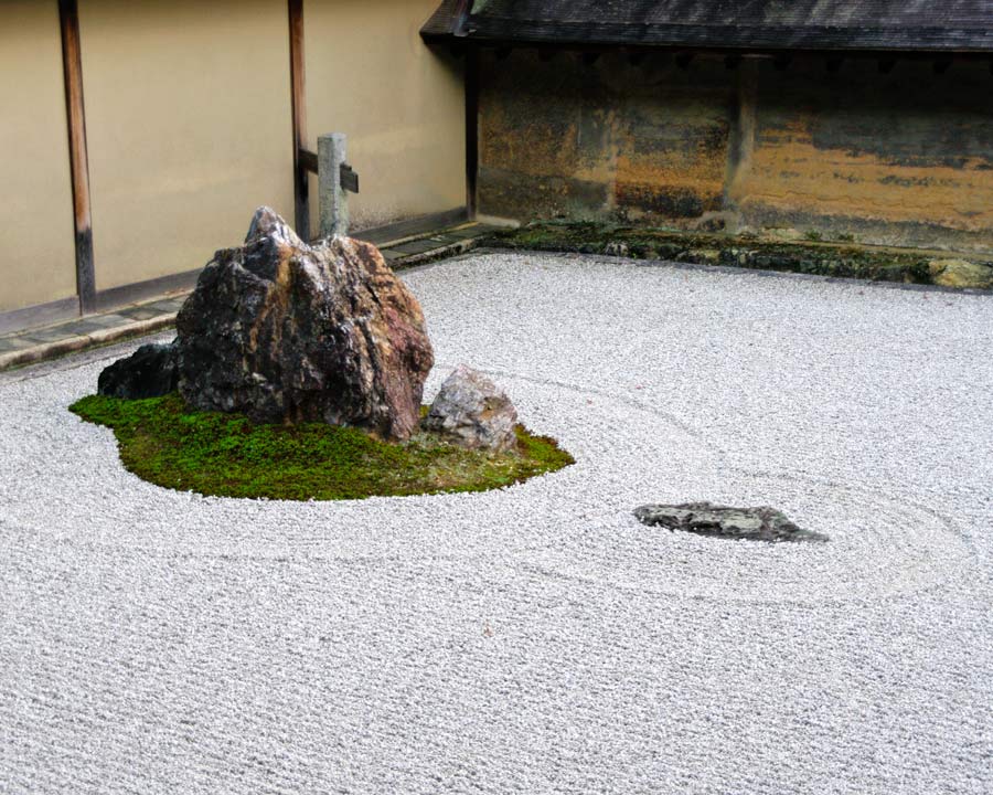 Ryoanji Zen Rock Garden, Kyoto, perfectly raked gravel around each group of rocks